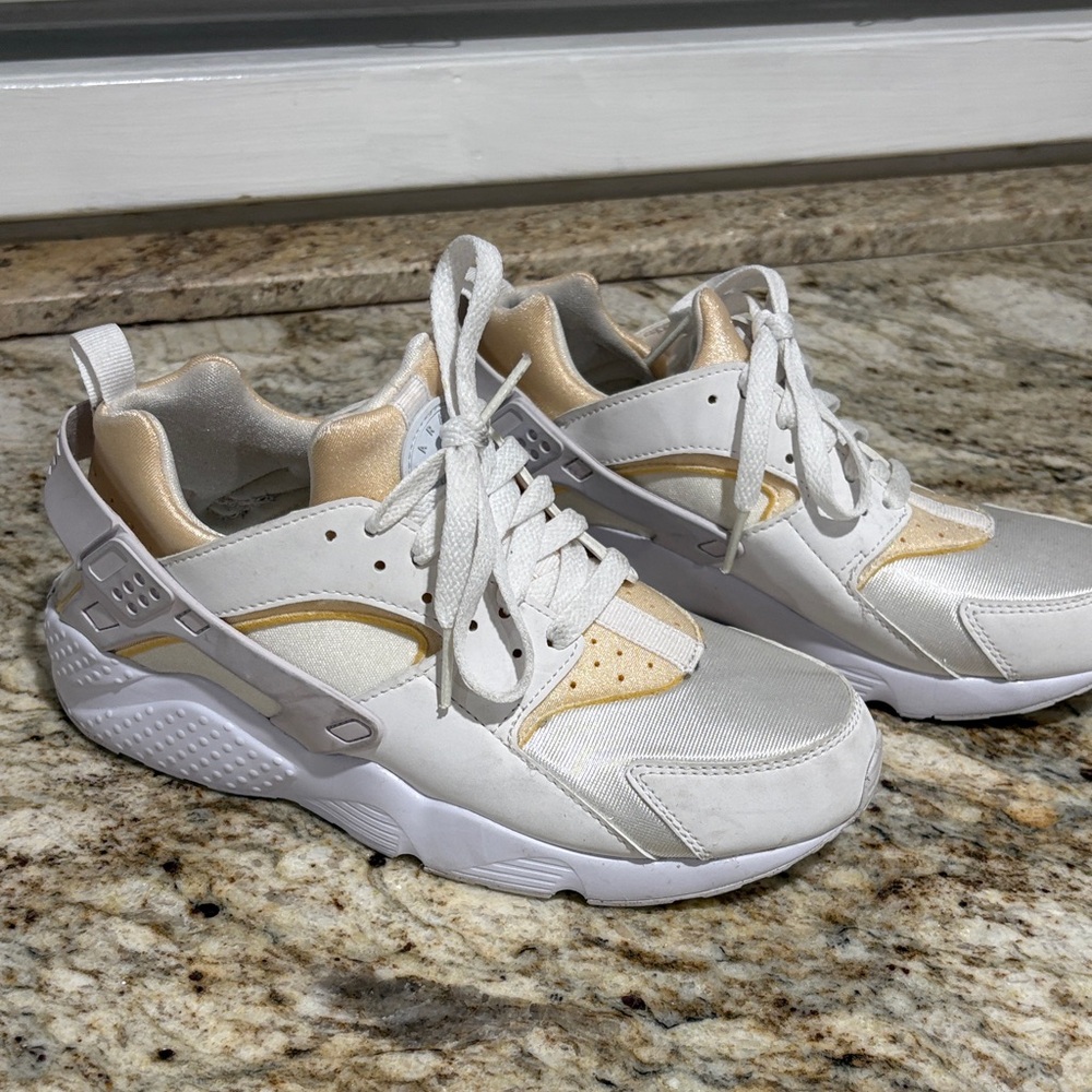 Women’s Nike Huarache White and Gold Athletic Sneakers